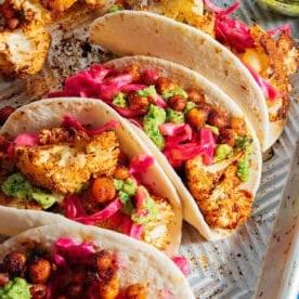 Chickpea cauliflower tacos with pickled red onion.