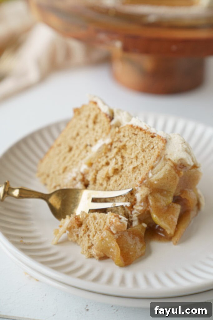 Mini apple cakes with brown butter frosting being assembled