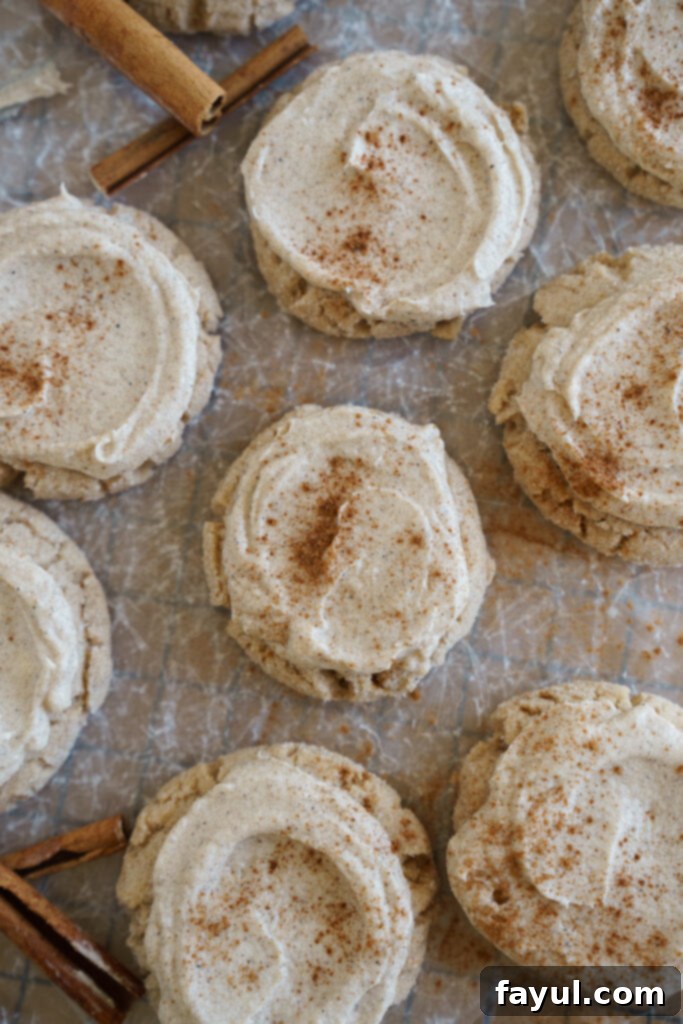 A single Chai Sugar Cookie on a cooling rack, showcasing the rich, creamy frosting.