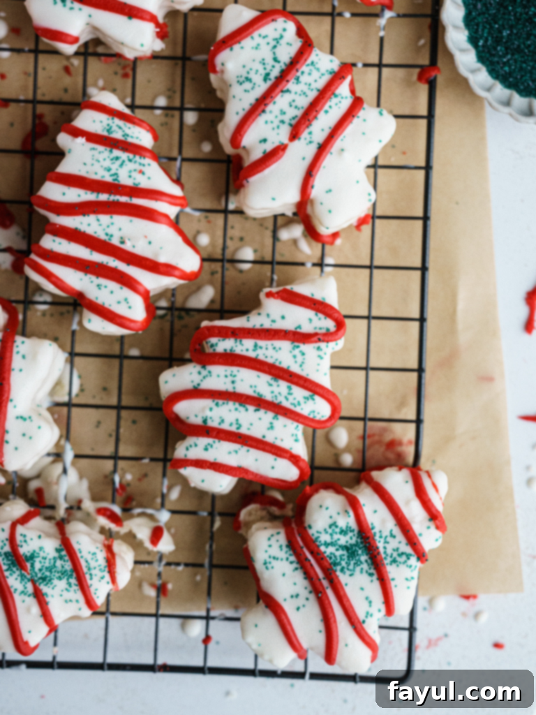 Delicious Homemade Little Debbie Christmas Tree Cakes with white chocolate and festive sprinkles