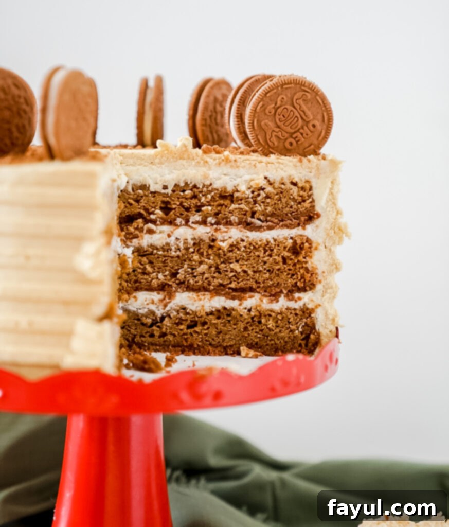 Assembled Oreo Gingerbread Cake layers before the final frosting, showing the cream cheese filling.
