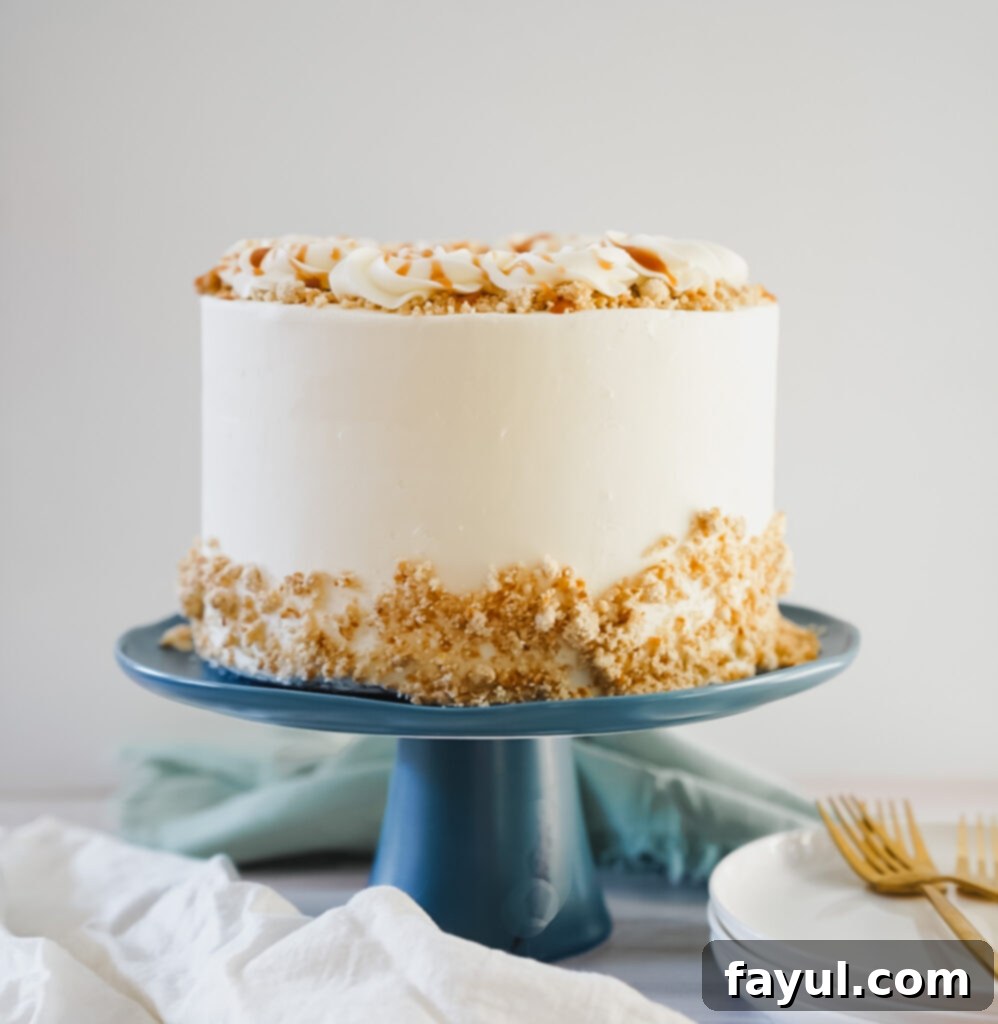 Beautifully decorated White Chocolate Caramel Pretzel Cake