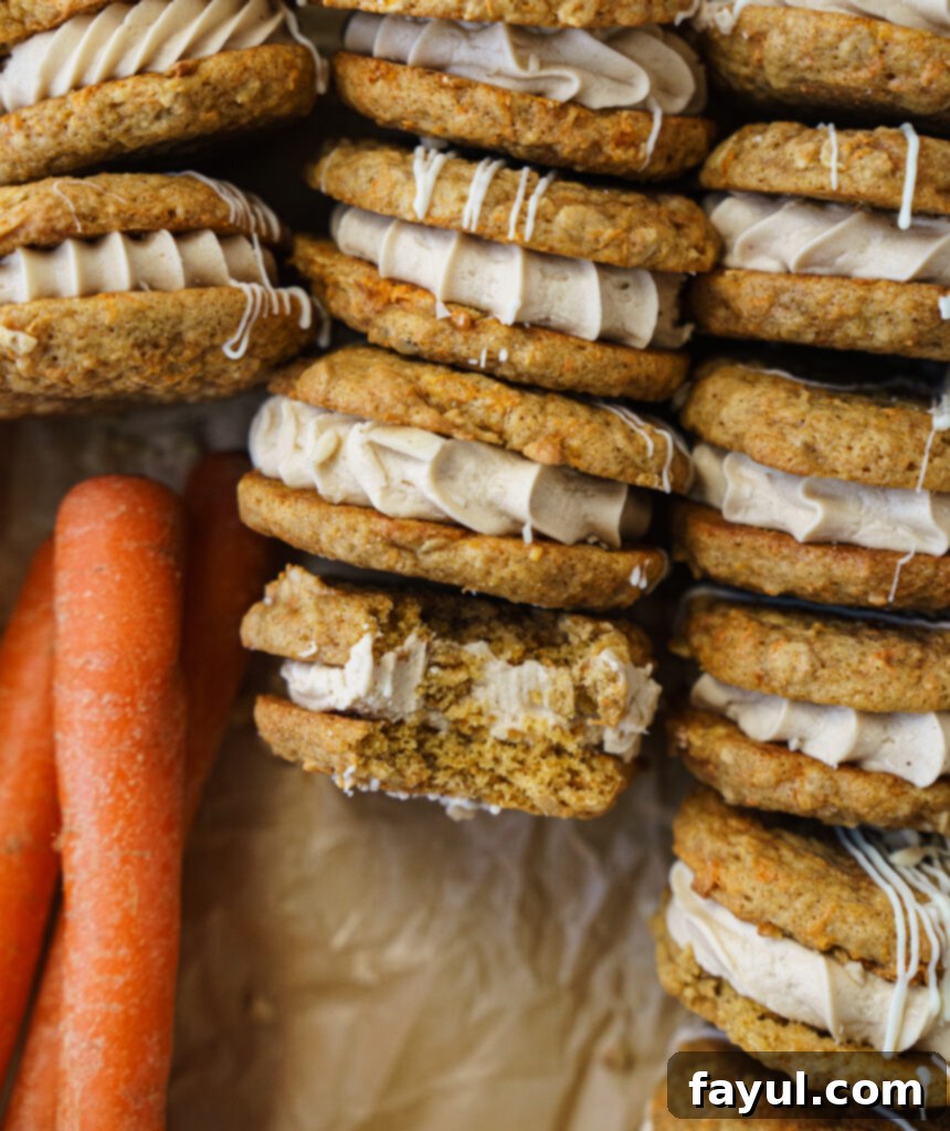 Finished Carrot Cake Cookie Sandwiches drizzled with white chocolate and sprinkled with nuts.