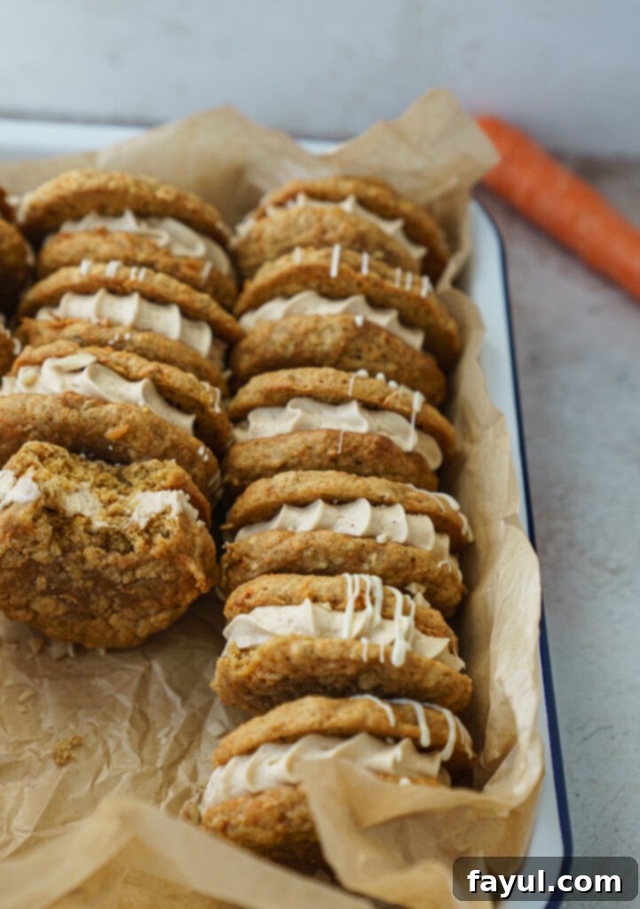 Close-up of a single Carrot Cake Cookie Sandwich, showing the rich frosting and chewy cookie texture.