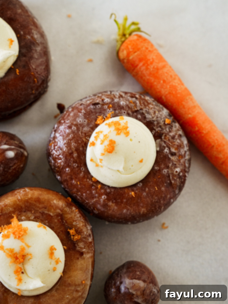 Carrot Cake Brioche Donuts - Golden brown, fluffy donuts topped with luscious cream cheese frosting, perfect for Easter or any special occasion.