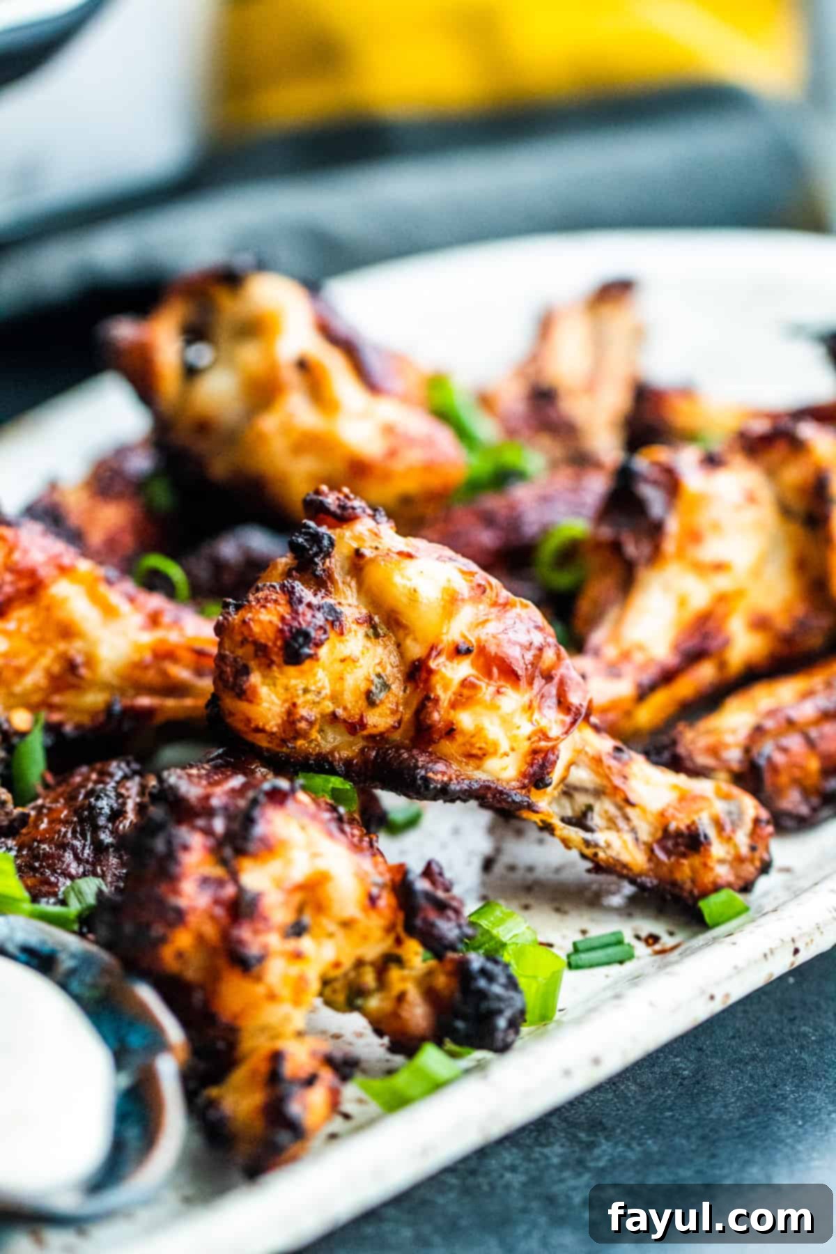 Angle shot of platter of chicken wings.