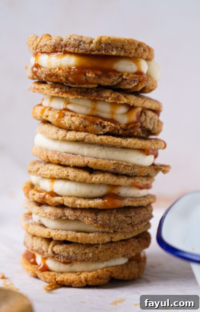 Stacked Snickerdoodle Caramel Cookies showing the layers of cookie, frosting, and caramel