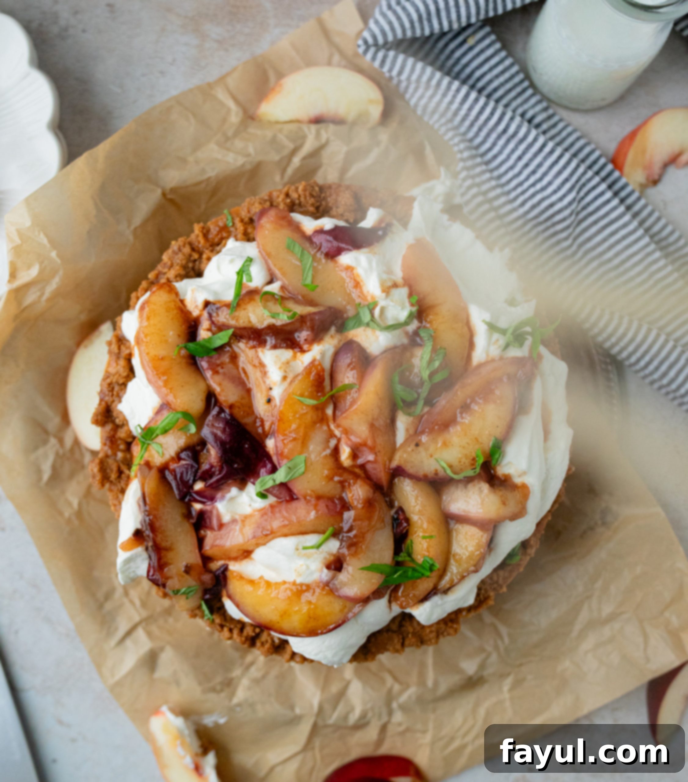 Close-up of the unbaked peach cobbler cheesecake with streusel topping