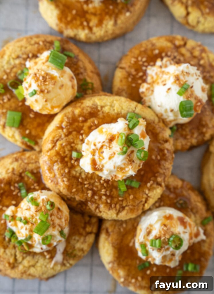 Stacked Savory Cornbread Cookies showcasing the sesame buttercream and soy caramel.