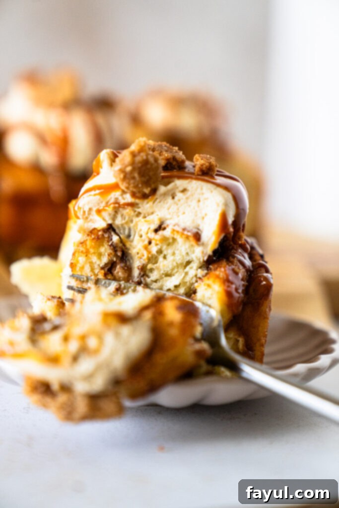 Close-up of a stack of fluffy Dulce de Leche Cinnamon Rolls