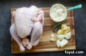 All the ingredients for the herb butter roasted turkey laid out on a kitchen counter, ready for preparation.