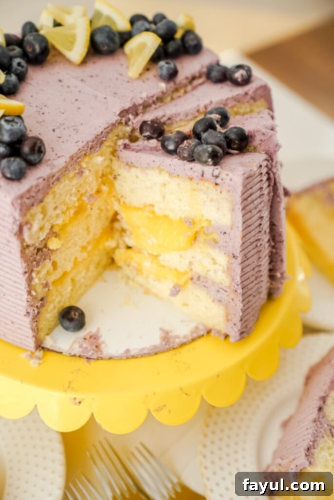 Freshly baked lemon cake layers cooling on a wire rack.