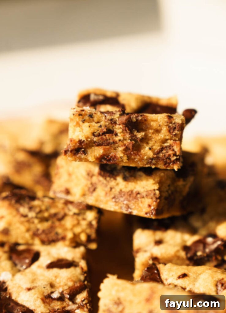 Close-up of brown butter in a glass bowl, showcasing its nutty specks