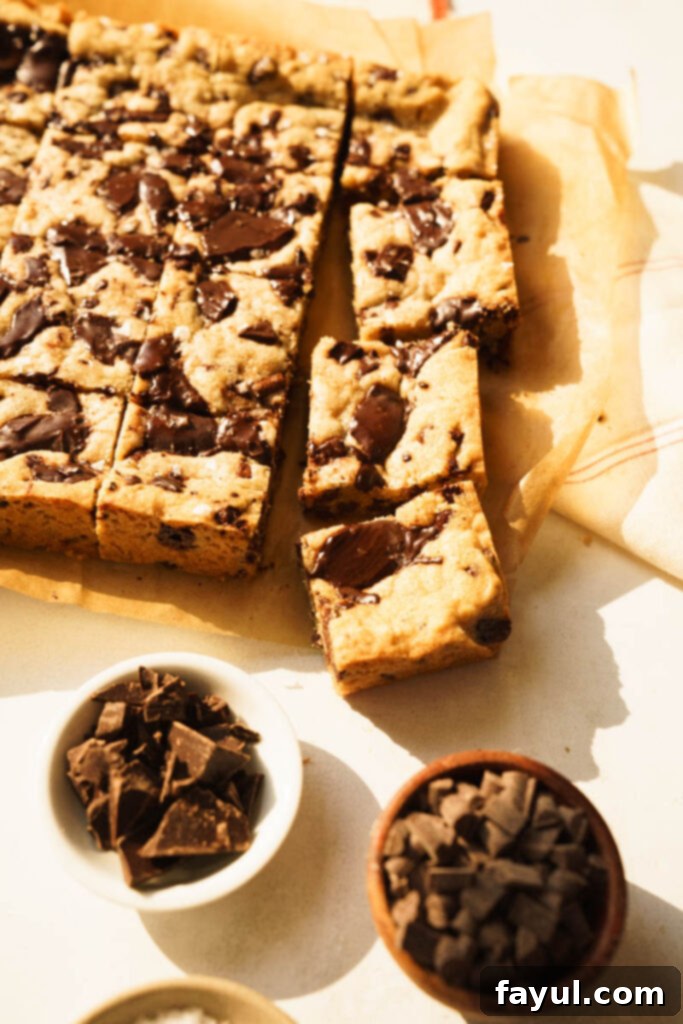 Freshly baked Brown Butter Blondies in a pan, ready to be cut