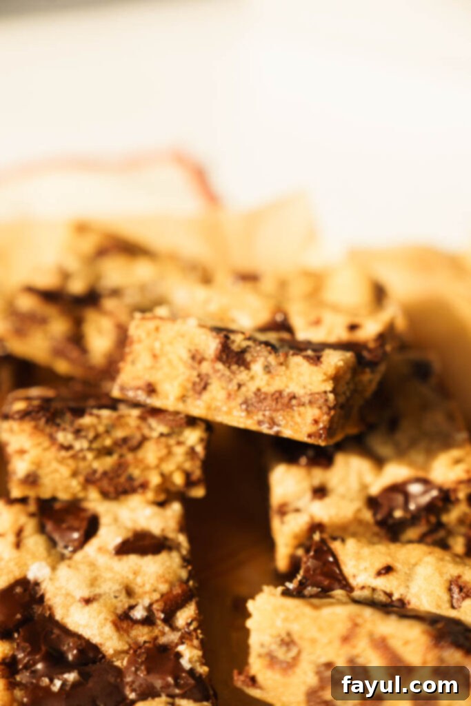 Stack of Brown Butter Blondies showing their chewy interior