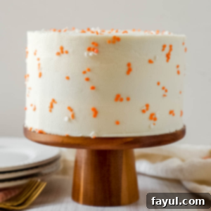 Slice of Brown Butter Carrot Cake with cream cheese frosting