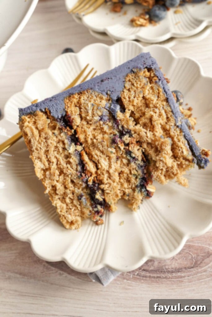 Close-up of fresh blueberries, brown sugar, oats, and cinnamon, key ingredients for the Blueberry Crisp Cake.