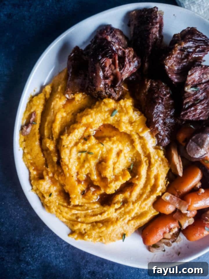 Overhead shot of finished plate with potatoes and ribs.