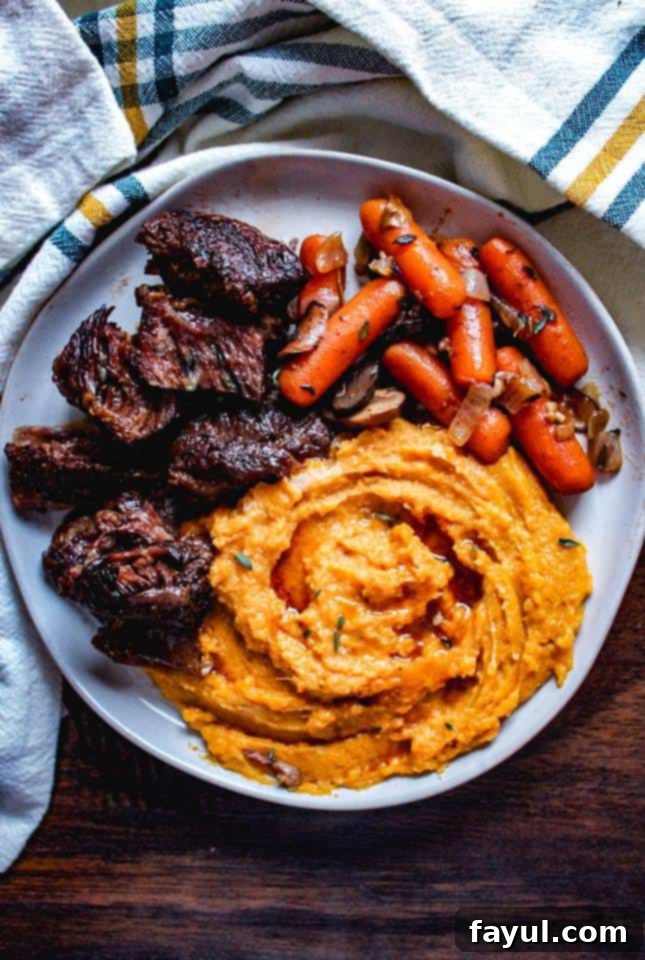 White plate of food on wooden flat lay.