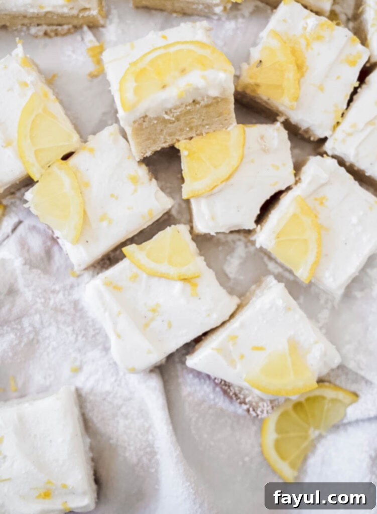 Baked lemon cookie bars cooling in a pan, ready for frosting