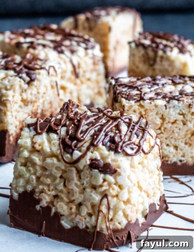 Large Nutella Rice Krispie Treat on a white plate, showing the rich chocolate hazelnut topping
