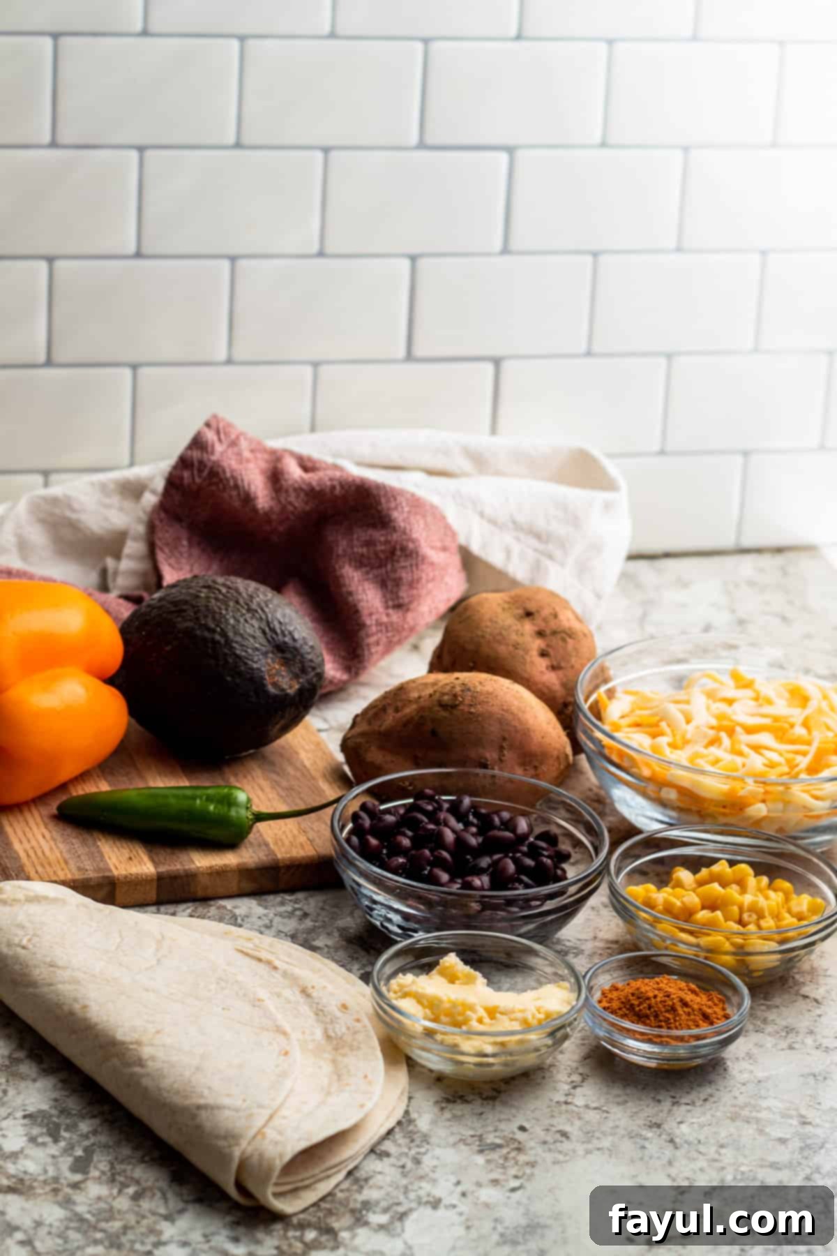 Vegetarian quesadillas ingredient shot showing all ingredients needed for this recipe on a white counter,