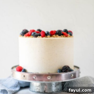 Hero shot of the finished Triple Berry Cake, beautifully decorated and ready to serve.
