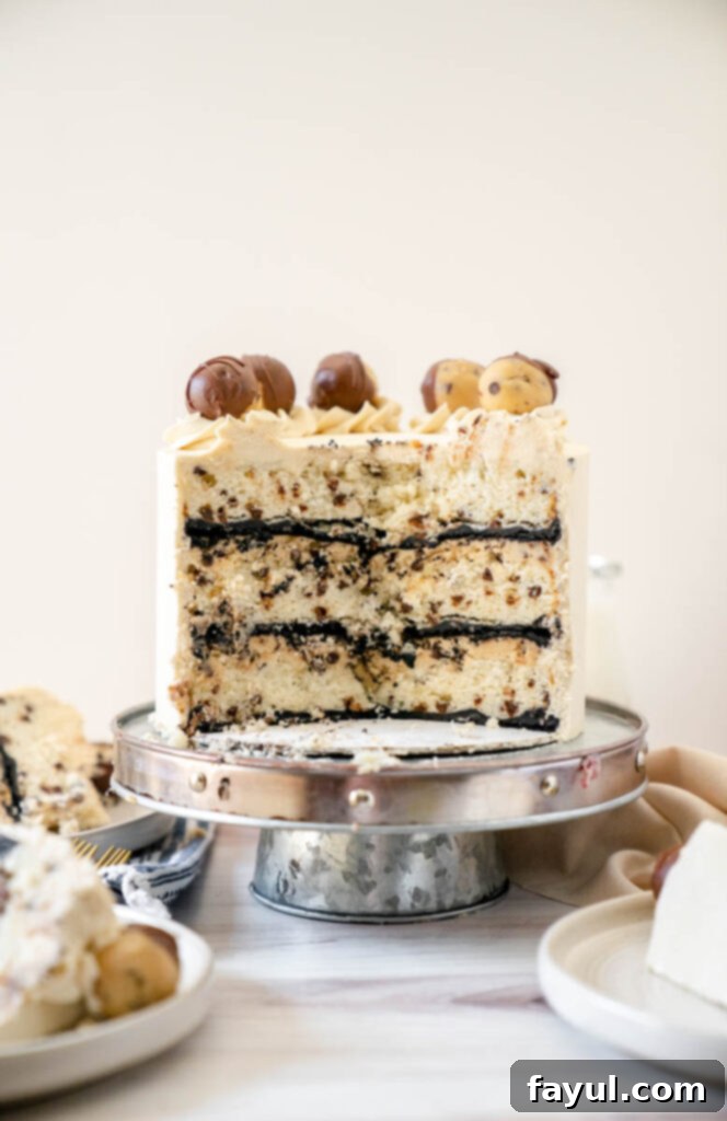 A stack of the finished Cookie Dough Cake layers, ready for frosting.