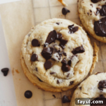 Deliciously chewy chocolate chip cookies, stacked and ready to eat