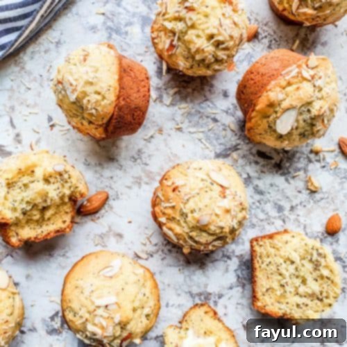 Muffins scattered on white counter.