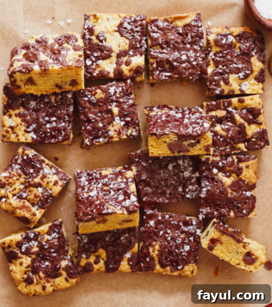 Freshly baked Pumpkin Chocolate Chip Blondies cooling on a rack