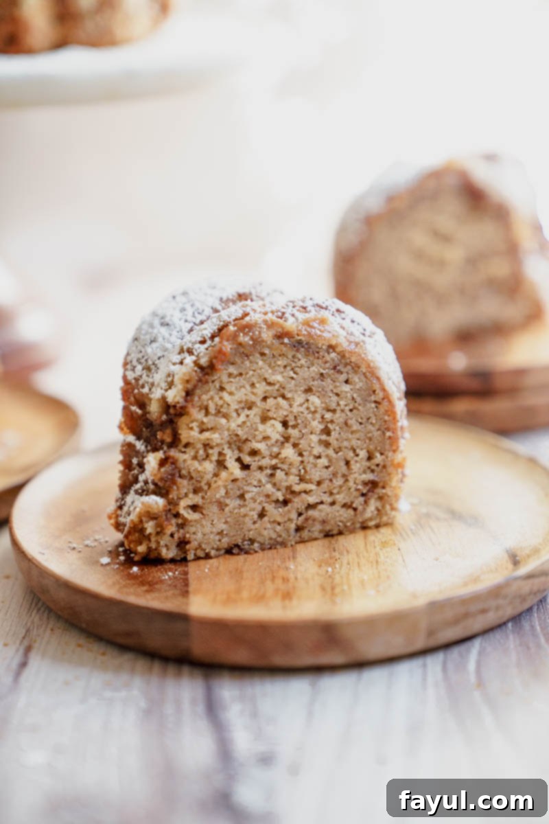 Apple Cider Donut Cake inverted on a cooling rack