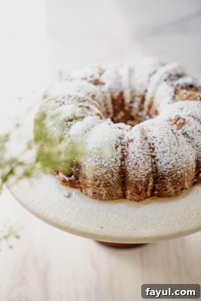 Slice of Apple Cider Donut Cake with a fork