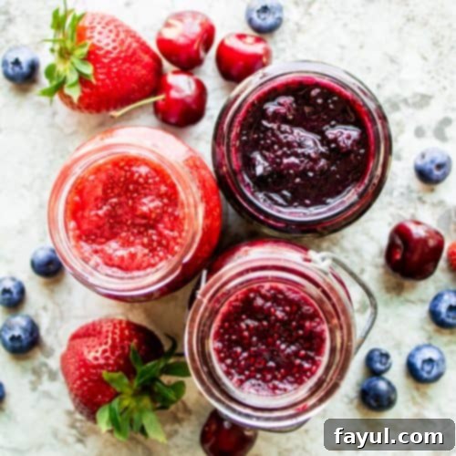 This Easy Jam Recipe is healthy, easy, made with only 3 ingredients (fruit, honey, and chia seeds), made without pectin and ready in only 10 minutes! The best spread for bagels, toast or any breakfast favorite. This recipe is also food sensitivity friendly and is gluten free, nut free, vegan, dairy free, paleo, vegetarian. Enjoy this no canning required blueberry, cherry, and strawberry jam! #jam #vegan #glutenfree #breakfast