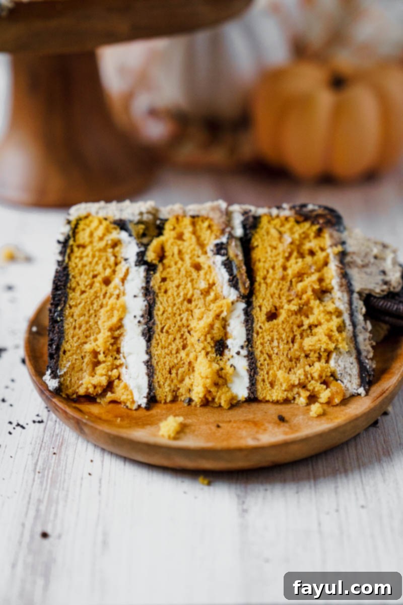Top view of the Pumpkin Oreo Cake with a dollop of buttercream