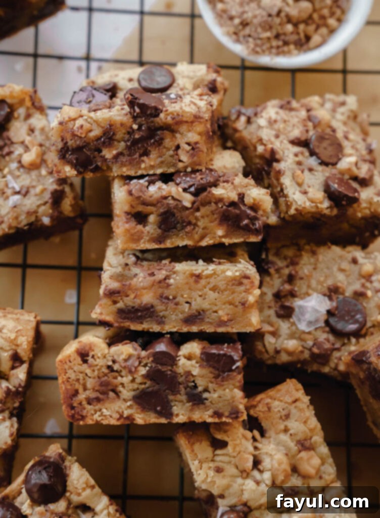 Delicious Dark Chocolate Toffee Blondies with a rich, chewy texture.