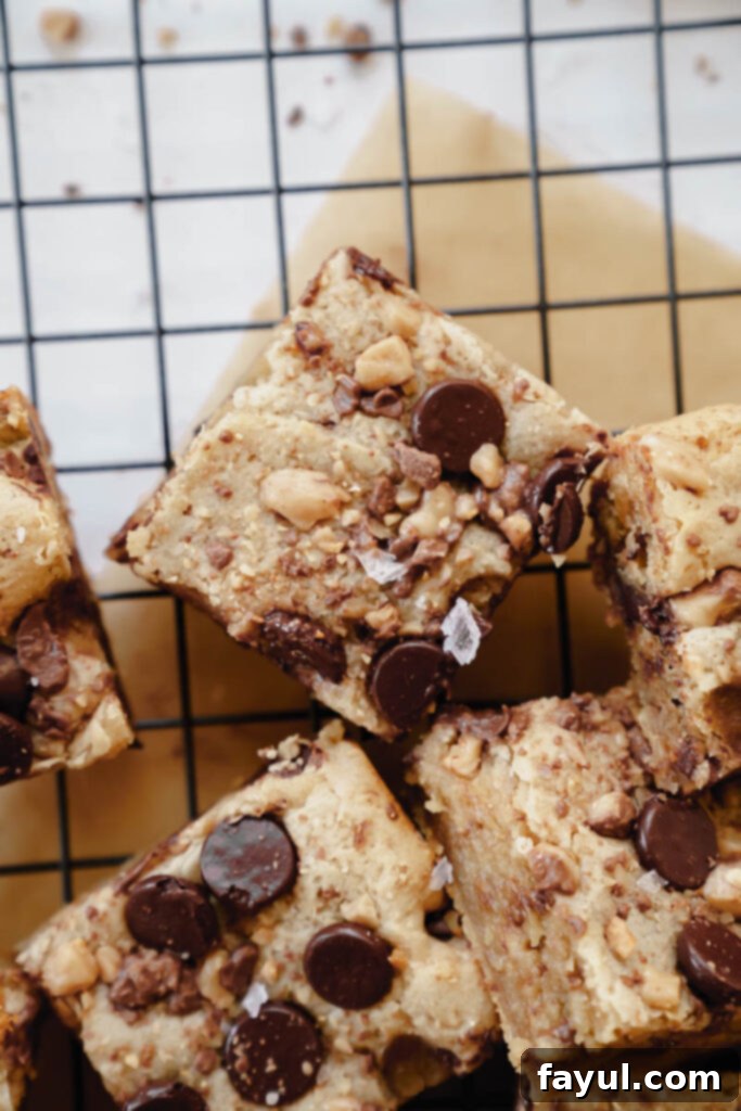 Overhead shot of freshly baked Dark Chocolate Toffee Blondies in a pan.