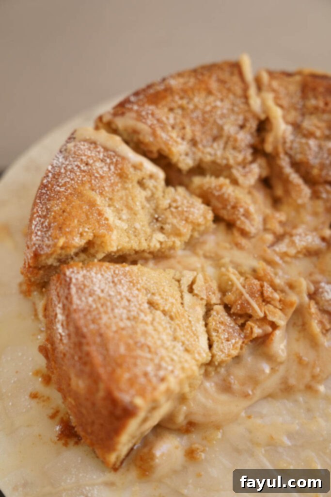 Cake batter with pears in a baking pan