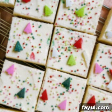 Christmas Sugar Cookie Bars with festive sprinkles