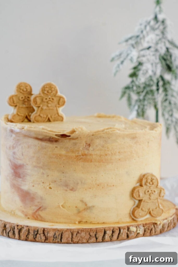 Close-up of a slice of Caramel Gingerbread Cake revealing moist layers.