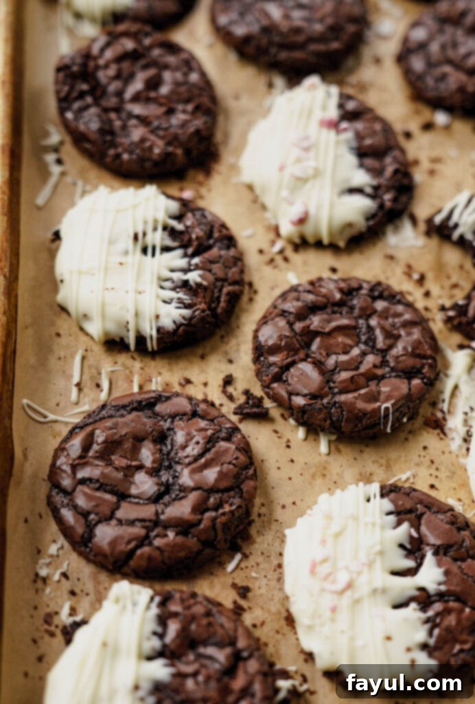 Freshly baked brownie cookies cooling on a wire rack