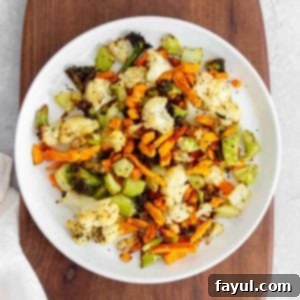 A plate of air fryer frozen vegetables, beautifully seasoned and crispy.