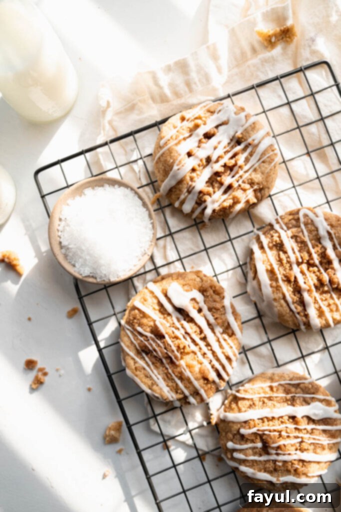 Stacked Coffee Cake Cookies with a bite taken out, showing the filling
