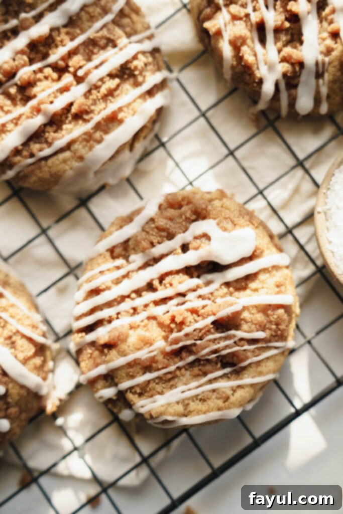 Coffee Cake Cookies with glaze and streusel on a plate