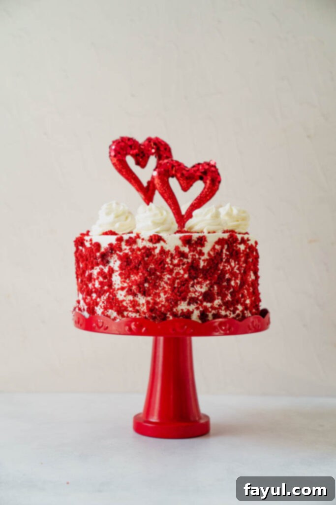 Red Velvet Cake with a perfectly smooth crumb coat of cream cheese frosting