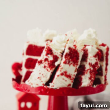 A beautiful slice of Red Velvet Cake with cream cheese frosting