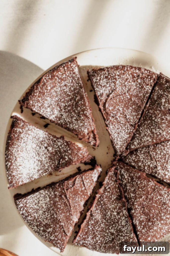 slice of flourless chocolate cake on a plate