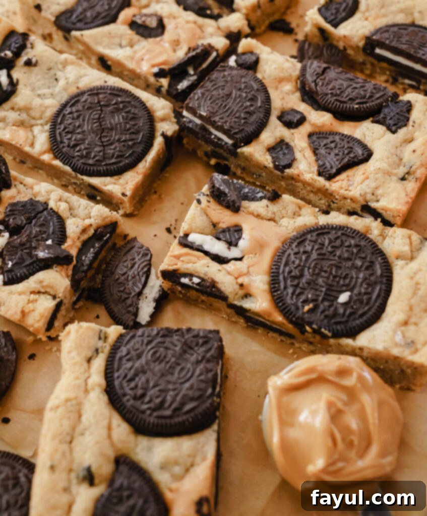 Raw dough of Peanut Butter Oreo Bars in a baking pan