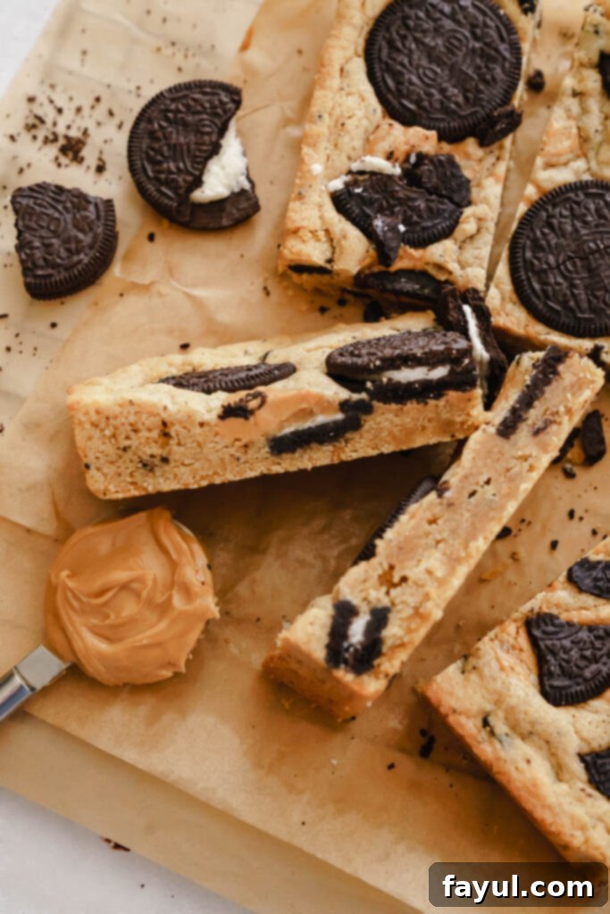 Peanut Butter Oreo Bar close-up with a glass of milk