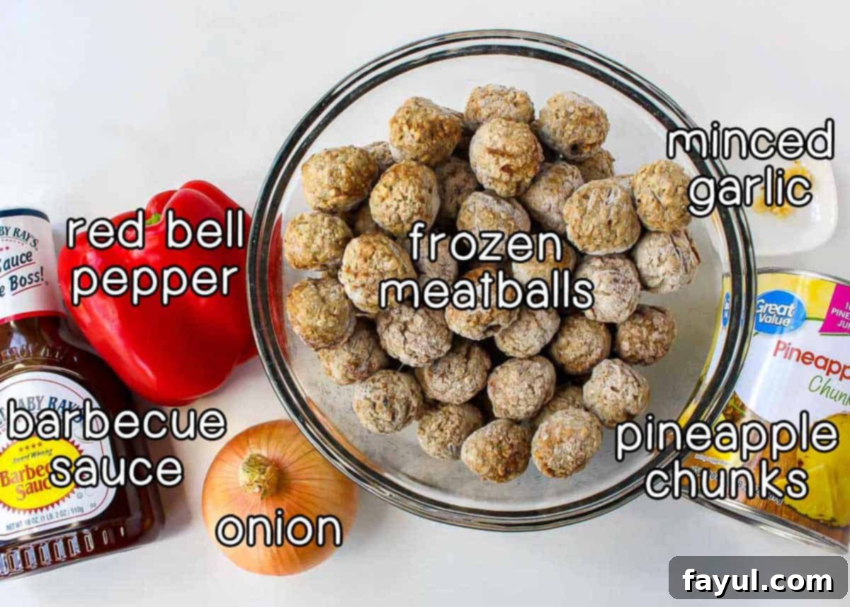 Overhead shot of ingredients for Hawaiian Meatballs: minced garlic, pineapple chunks, frozen meatballs, red bell pepper, onion, and barbecue sauce, neatly arranged.